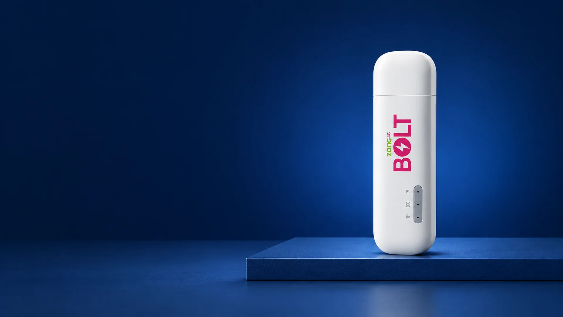 White Huawei E8372 Zong Bolt USB wingle on a blue studio display